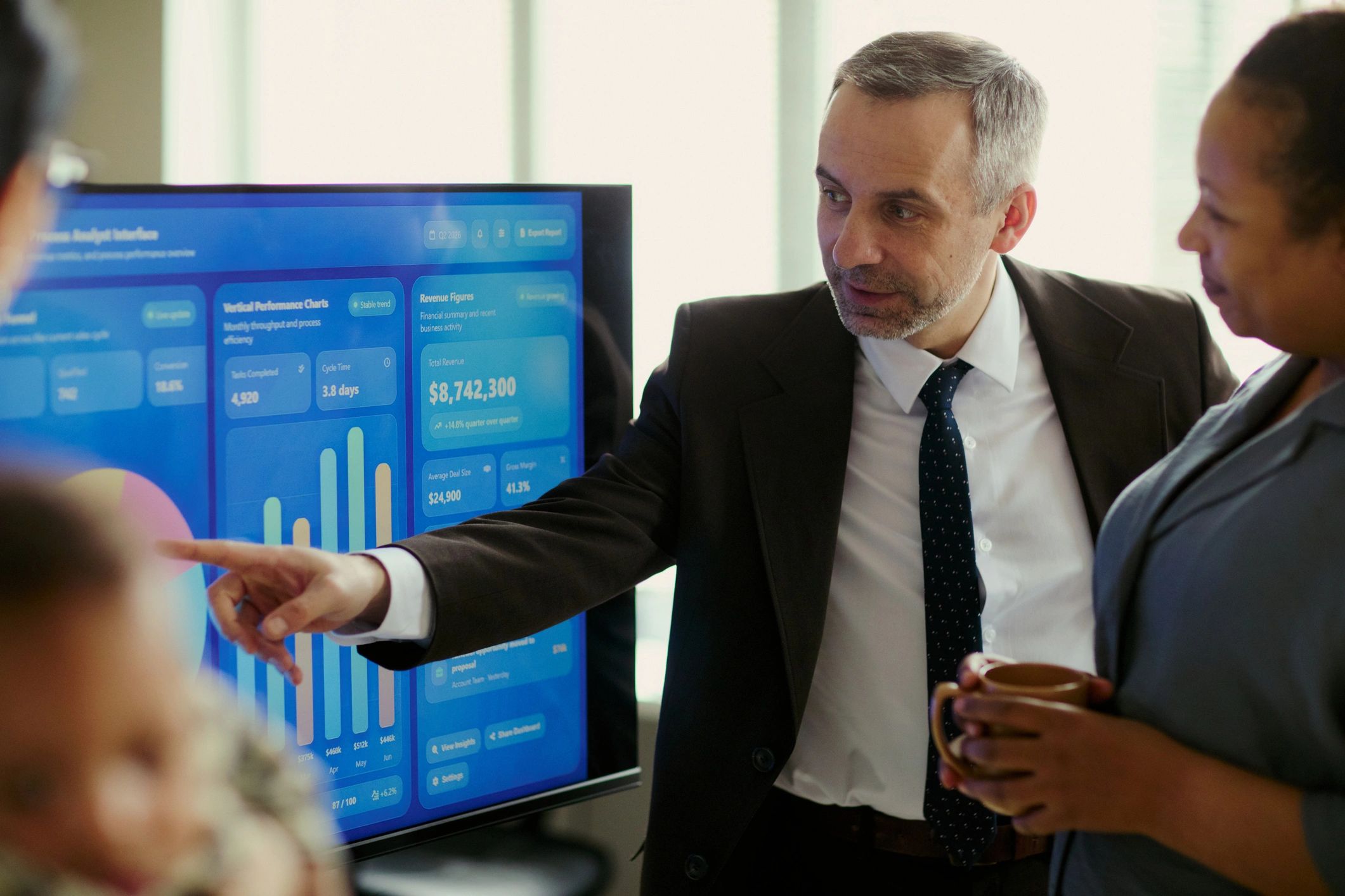 Executive presenting strategy during an office meeting